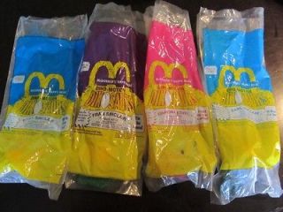   1992 Disney Dinosaurs tv show McDonalds Happy Meal toys in packages