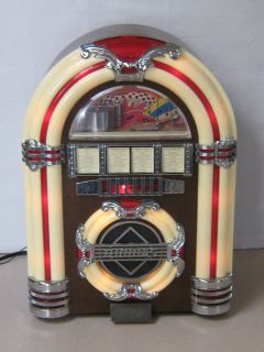   Crosley Table Top Lighted Juke Box With AM FM Radio & Cassette Player