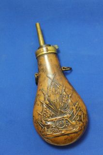 ANTIQUE COPPER BLACK POWDER FLASK EMBOSSED WITH CANNON & FLAGS