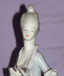 Hungarian Hollohaza Porcelain Lady with Musical Notes figurine