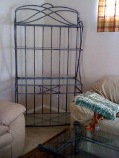 Moving Sale  Used Bakers Rack   Very nice Glass and Iron frame.