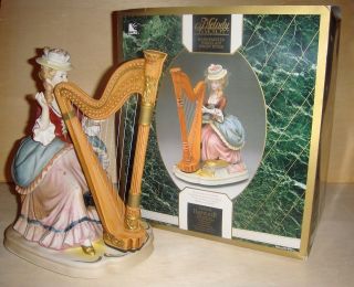 Melody in Motion Lady Playing Harp Porcelain Music Box
