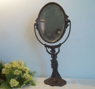 Antique cast bronze swivel beveled mirror.Art Nouveau lady figurine 