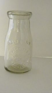 Oshkosh Wi,vintage all glass milk drinking jar,old advertising milk co 