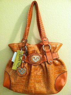 burnt orange purse in Handbags & Purses