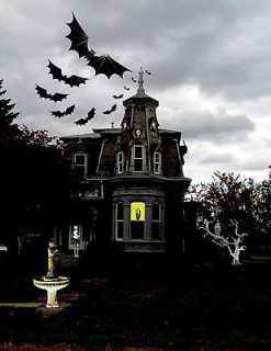   house ghosts in windows raven in tree flying bats goddess in garden