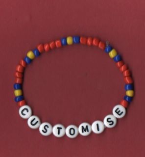   /Persona​lise red blue and yellow bracelet with choice of caption