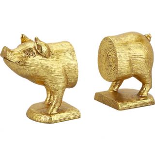 gold pig bookends set of 2 in storage  CB2