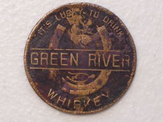 GREEN RIVER WHISKEY ITS LUCKY TO DRINK BRASS TOKEN, HORSESHOE