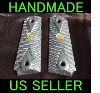 Silver pearl 1911 colt .45 grips with gold Colt medallion