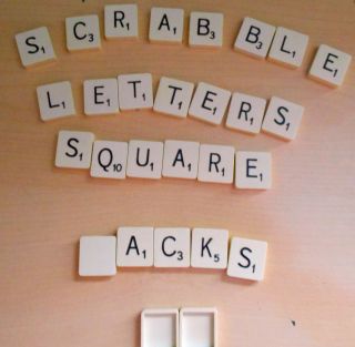 SQUARE BACKS SPARE SCRABBLE( BLACK) TILES TO COMPLET YOUR GAME