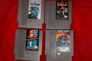 NES Kight Rider, Robocop, Super Mario/Duck Hunt, and Top Gun   4 Games 