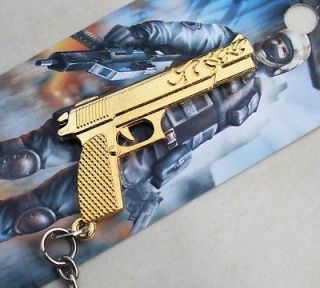 special keyring gun pistol gold key chains keyfobs kga38 from