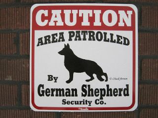 Sign CAUTION AREA PATROLLED by German Shepherd Security Co.