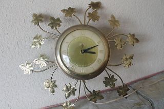 vintage leaf wall clock sunburst style by united time left