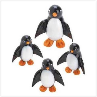 playful penguin family figurines  9 99 0