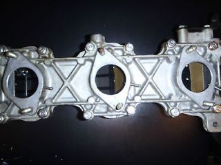 Manifold and Reed Vassy FROM A 1991 YAMAHA 90 HP 2 stroke OUTBOARD