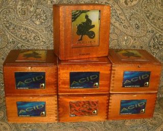   collection of seven heavy wooden cigar boxes from acid several sizes