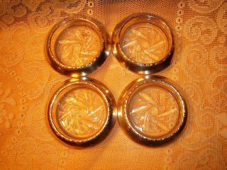 VINTAGE SET OF FOUR AMSTON STERLING SILVER AND GLASS COASTERS