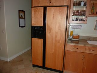 Beautiful Wood Paneled Amana Side by Side Refrigerator