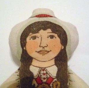 You are bidding on the Annie Oakley doll and a story about her life 