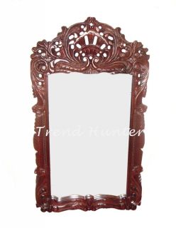 description decorative wall mirror in antique carved wood frame 