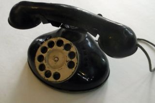 ANTIQUE METAL TIN TOY ROTARY TELEPHONE WITH OPERATING RINGER