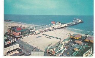  card view of the amusement park and rides at Steel Pier in Atlantic 