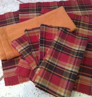    Setting In Fall Colors Plaid Placemats With Matching Cloth Napkins
