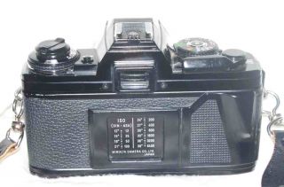 Minolta X700 35mm SLR Camera with 50mm 1 1 4 Lens Filter Vintage Strap 