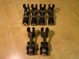 For auction is this nice collection of AKG microphone clips.