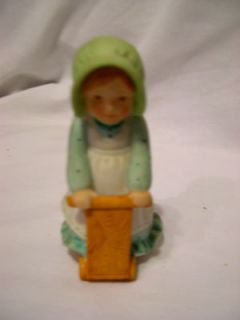   Holly Hobbie figurine green dress riding wooden scooter 3.5 porcelain