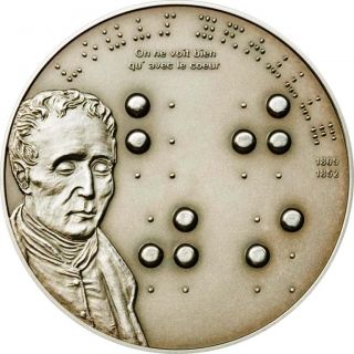   beautiful portrait of louis braille with the date embossed in braille