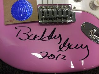 Buddy Guy autographed Fender Squier Bullet Strat pink with white pick 