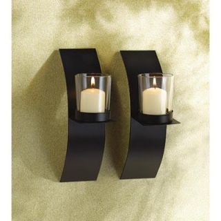   this striking pair of candle sconces matte black finish lends drama