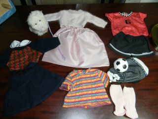    LOT OF AMERICAN GIRL RETIRED CLOTHES AND COCONUT THE DOG SOCCER BALL