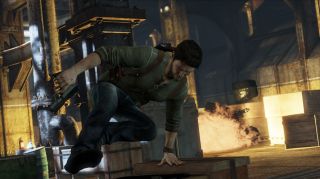 Drake hustling through a game environment with weapon in hand in 