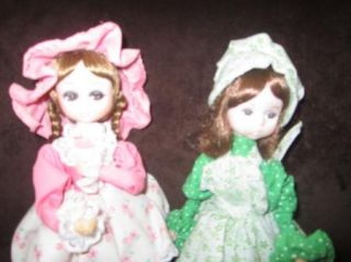   Bradley dolls on stands. Pink Chrissy and March lass Nice vintage