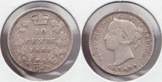 1883h canada silver 10 cents has been lightly cleaned sometime in the