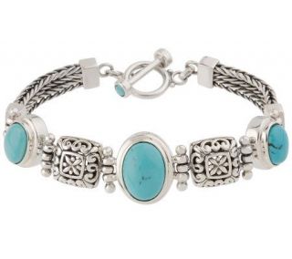 Oval Turquoise Sterling 7 1/4 Graduated Toggle Bracelet —