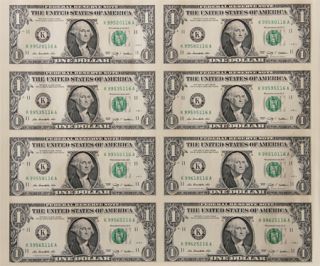 uncut of crisp uncirculated; $1. $2 $5 & $10 us dollar bills.
