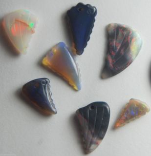 VERY COOL LOT OF 7 NATRUAL LIGHTNING RIDGE OPAL TOOTH CARVINGS DRILLED