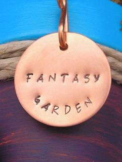 Completed with a hand stamped copper disc fantasy garden. A magical