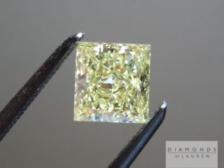 Princess Cut diamonds are rather rare in Fancy Yellow. This one has
