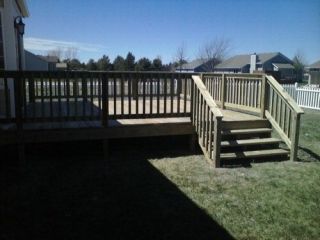 16 X 16 TREATED DECK WITH RAILING AND (1) SET OF STEPS   MATERIAL AND