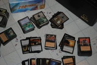  Ibs of magic cards w/ deck boxes, card pack boxes, and card protectors