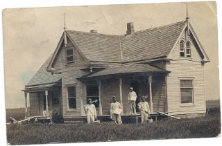 DESHLER NE RPPC 1909 MEN PREPARING TO PAINT OR PLASTER A HOUSE
