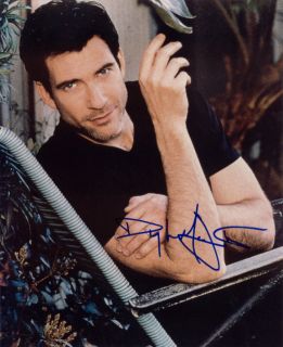 dylan_mcdermott_in_chair_hand_up