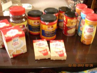 Huge Lot Of Folgers Ground Coffee, Cappucino, Creamer, and Flavored