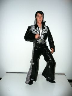 Elvis Presley Phoenix Doll and Other Collectible Figures and Dolls